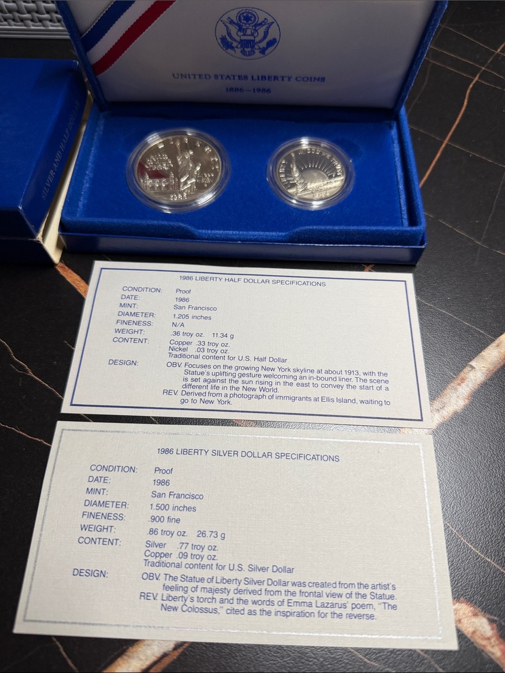 1986 liberty dollar and half dollar set